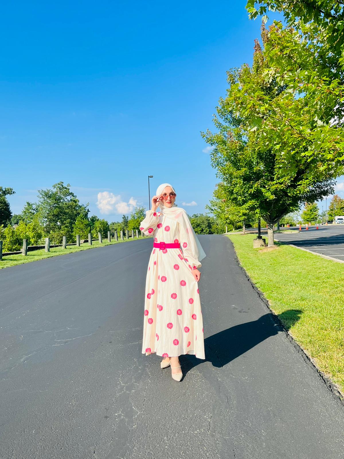 Pink and white long dress with red belt