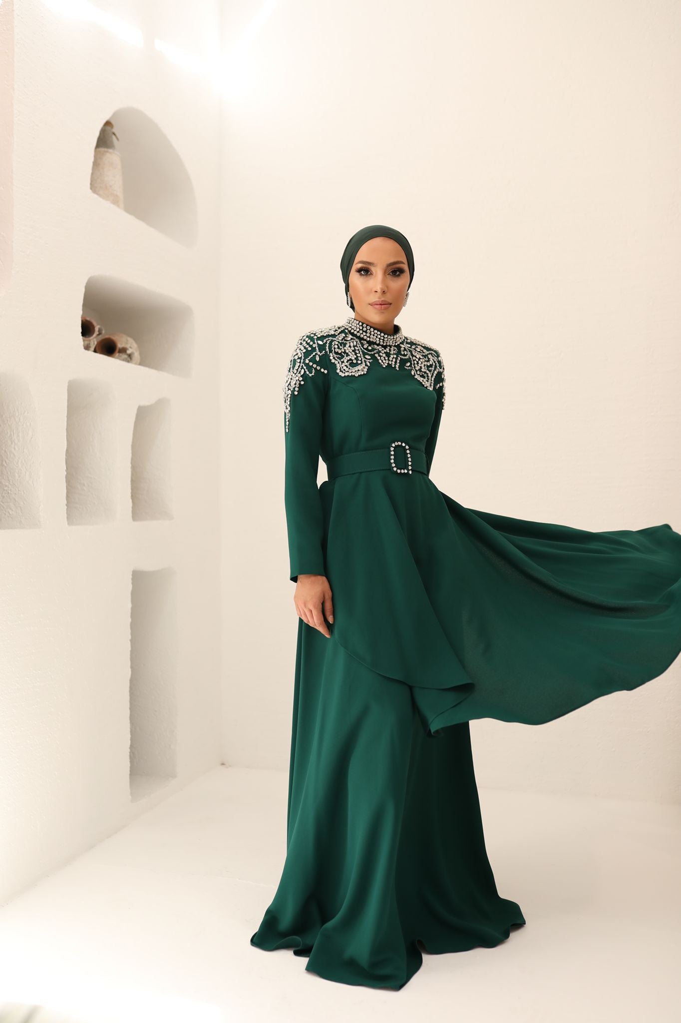 Elegant fancy green dress with long sleeves